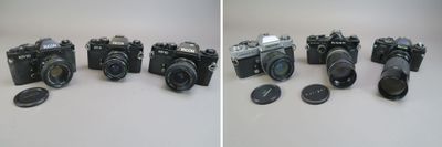 four different pictures of a camera and a coin on the table