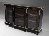 a black and gold painted cabinet with glass doors