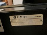 a close up of a piece of luggage with a name tag on it