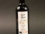 a bottle of wine that is sitting on a table