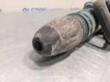an image of a close up of a drill on a table