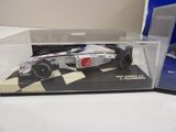 a model of a race car in a display case