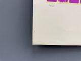 a picture of a piece of paper with a purple and yellow design on it