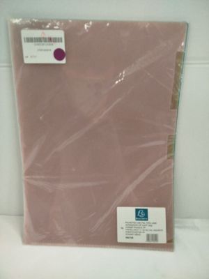 a pink sheet of paper on a white surface