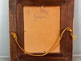 an old picture frame with a rope hanging from it ' s side