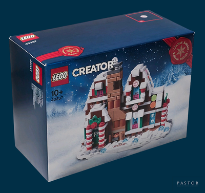 une boîte contenant un bâtiment construit en Lego