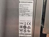 a close up of a stainless steel refrigerator with a label on it