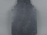 an image of a black stone plaque with a bird on it