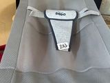 a close up of a shirt with a tag on it