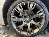 the tire of a car is shown with a flat tire