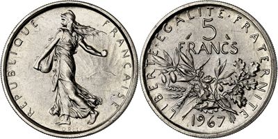 a coin with the image of a woman in a dress on it