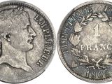 une pièce de monnaie en argent portant un visage de femme