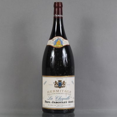 a bottle of wine that is sitting on a table