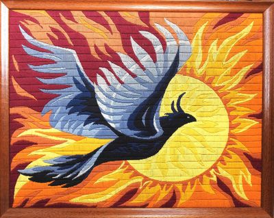 painting of a bird flying in front of a sun on a brick wall