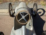 a toy car that is sitting on the street