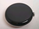 an image of a black pocket watch on a white surface