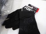 a pair of gloves that are sitting on a table