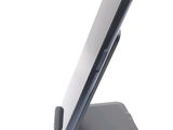 a close up of a cell phone on a stand