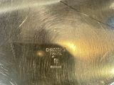 a close up of a metal pan with a lid