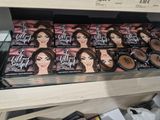 a display of makeup products for sale in a store