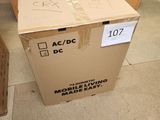 a box that is sitting on the floor in front of some boxes