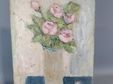 une peinture de fleurs dans un vase sur une table