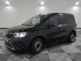 the black van is parked on a checkered tile floor