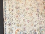 an antique rug with a floral design on a black background