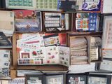 many different types of stamps on display in a box