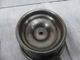 a silver cup that is sitting on a table