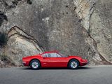 a red sports car parked on the side of the road