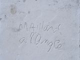 a cement block with writing on it that says happiness is refuge