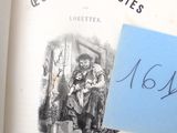 un livre sur lequel figure la photo d'un homme tenant un bébé dans ses bras