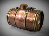 an image of a large copper barrel with a wooden top