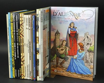 a lot of books that are sitting on a table