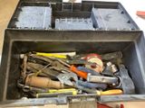 many tools in a tool box on the table