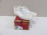 vans old skooler sneakers in white with white laces on top of a box