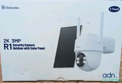 an image of a white box with a solar panel on top of it