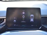 the dashboard of a car with a digital display on it