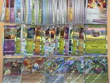 plusieurs types de cartes pokemon sur la table