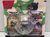 a pokemon figure and a toy in a package