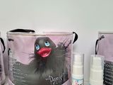 the contents of a bag with a rubber duck in it