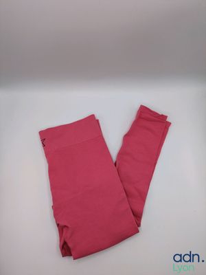 the leggings are pink and the leggings are red