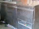 an image of a commercial kitchen with stainless steel appliances