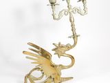 brass dragon candelab with candlesticks on a white background