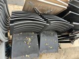 a lot of chairs that are sitting on the sidewalk