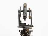 an image of a microscope on a white background