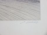 a black and white drawing of a man riding a motorcycle