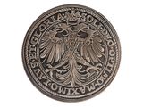 an image of a silver coin with an eagle on it