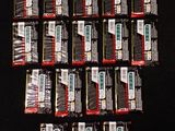 a lot of cigarettes that are on a black table